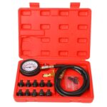 Maletín rojo con manómetro de 0 a 140 PSI y 10 adaptadores roscados para medir la presión de aceite del motor